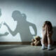 Domestic Violence - Little Girl Crying With Shadow Of Parents Arguing - Home Violence And Divorce